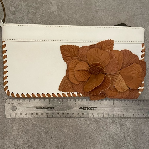 Jumar Drake white leather zippered wristlet / clutch with brass ring